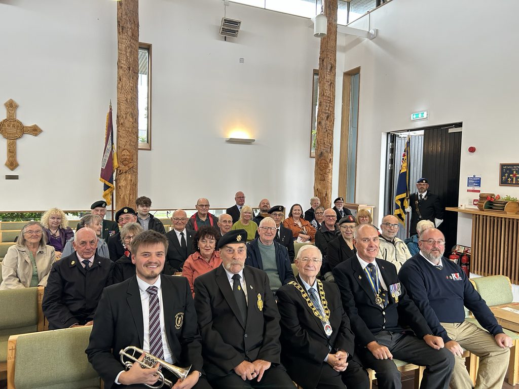 Joe sat in the Millenium Chapel of Peace with members of the Royal British Legion of Goole and Howden. The Mayor of Goole is also sat in the front row of chairs.